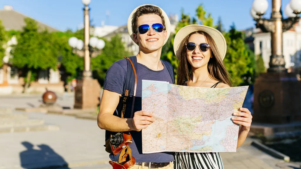 10 Game-Changing Smart Travel Gadgets You Can’t Miss for a Stress-Free Journey 2 couple sightseeing with map