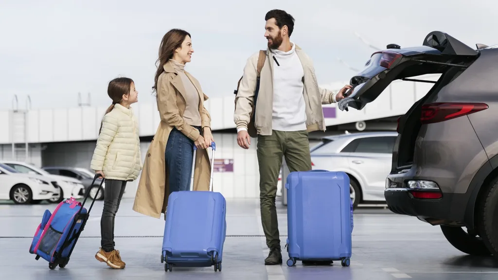 full shot adults traveling with kid