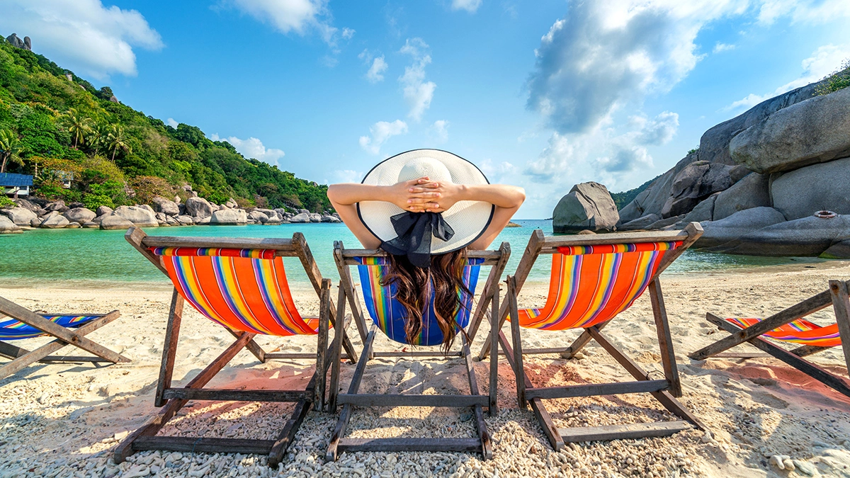 woman with hat sitting chairs beach beautiful tropical beach woman relaxing tropical beach koh nangyuan island