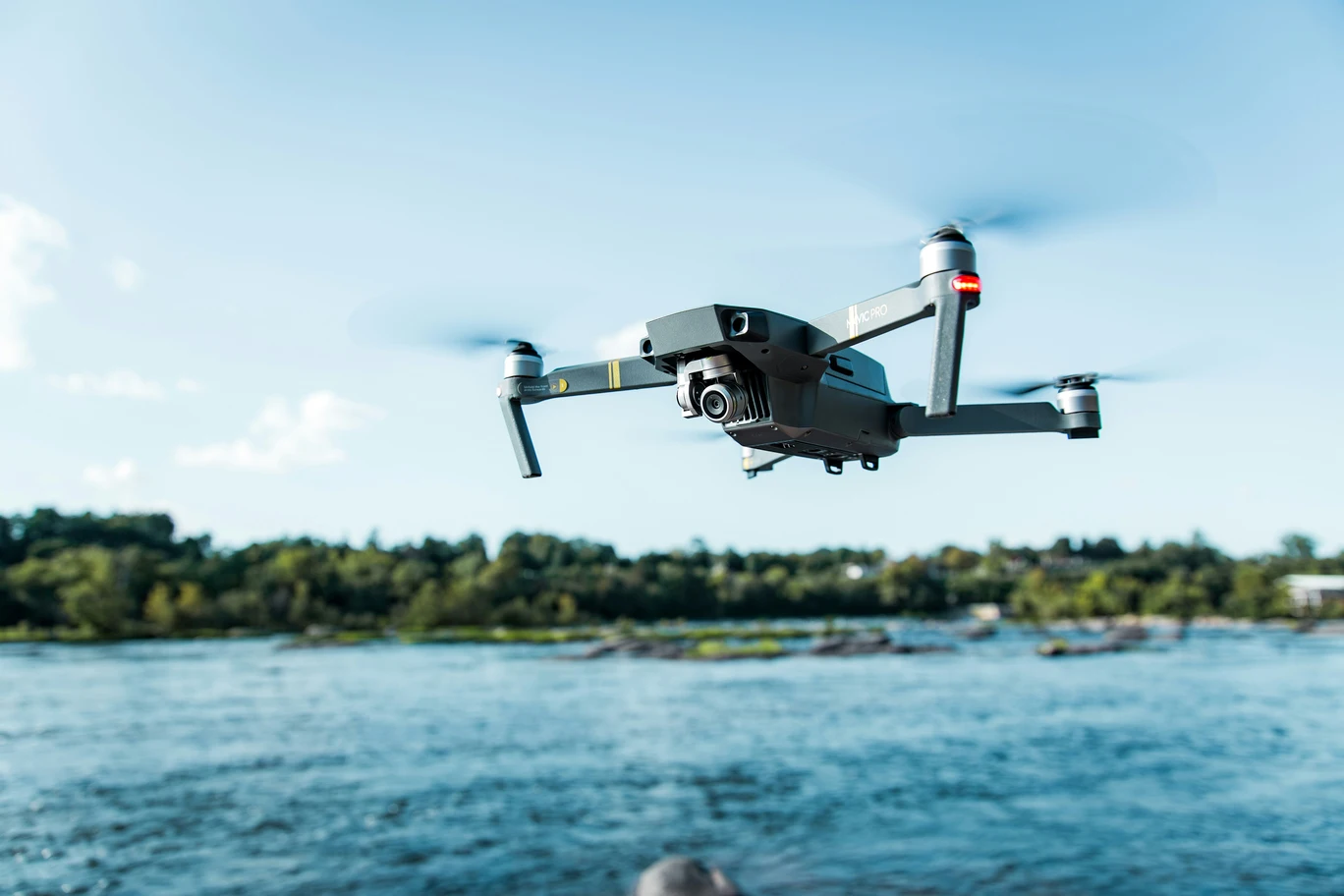 7 Powerful Ways AI Protecting Your Home Without You Noticing 3 drone above a body of water